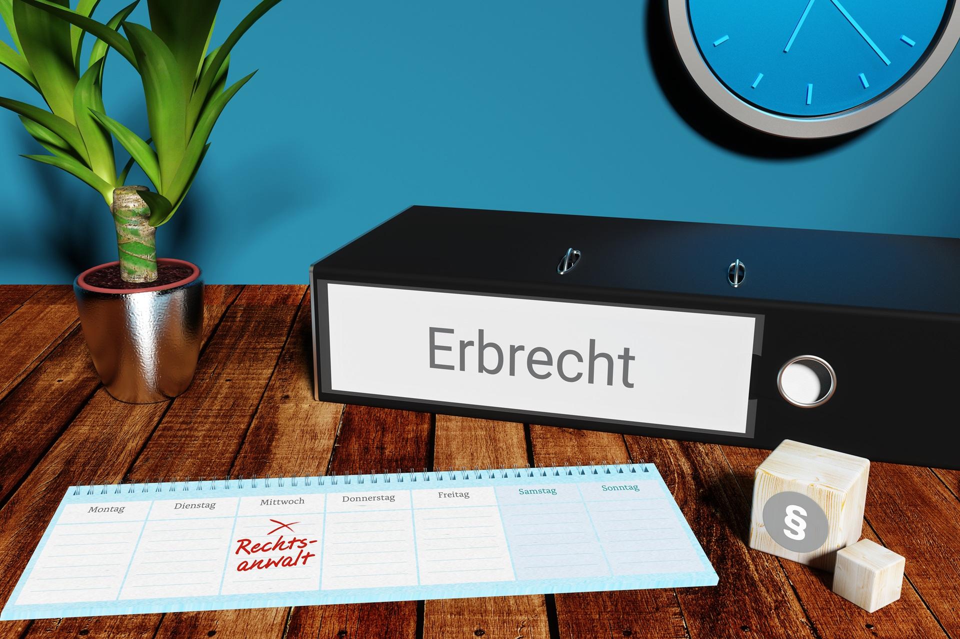Anwalt Erbrecht Dresden mit Aktenordner und Kalender